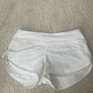 size 4 white lulu lemon athletic shorts